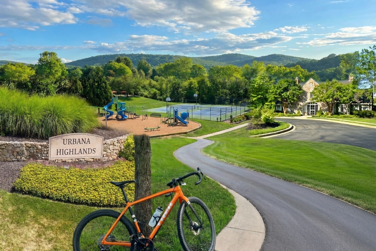 Urbana Highlands entrance sign with playground, tennis courts, clubhouse, and mountain views