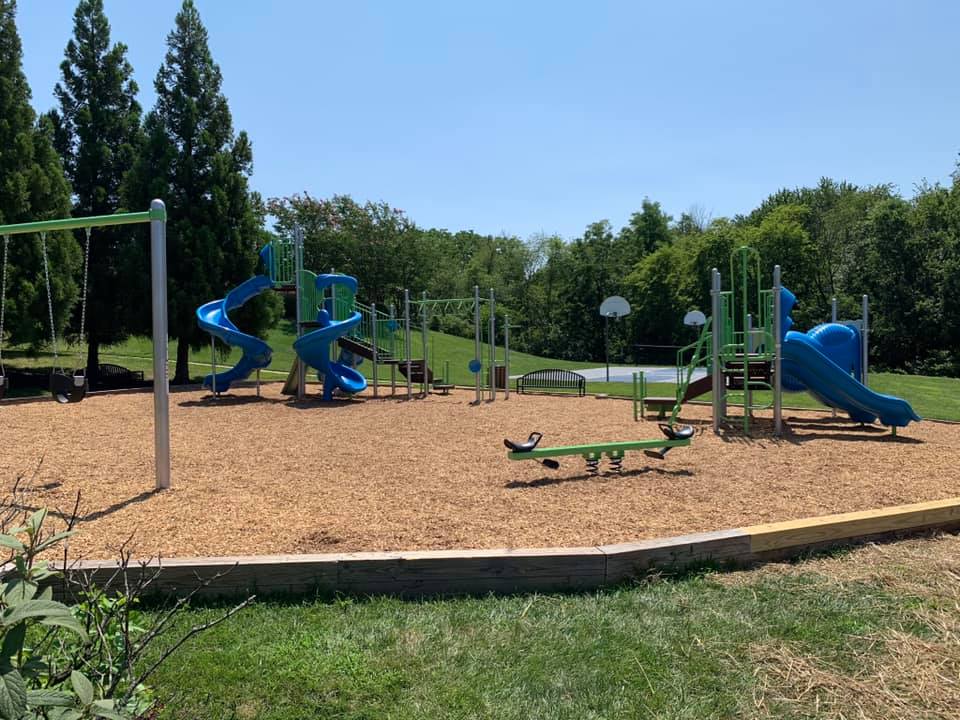 Community playground with slides and swings
